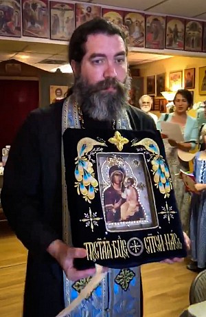 Fr. Christopher Johnson processes with the Hawaiian Iveron Icon